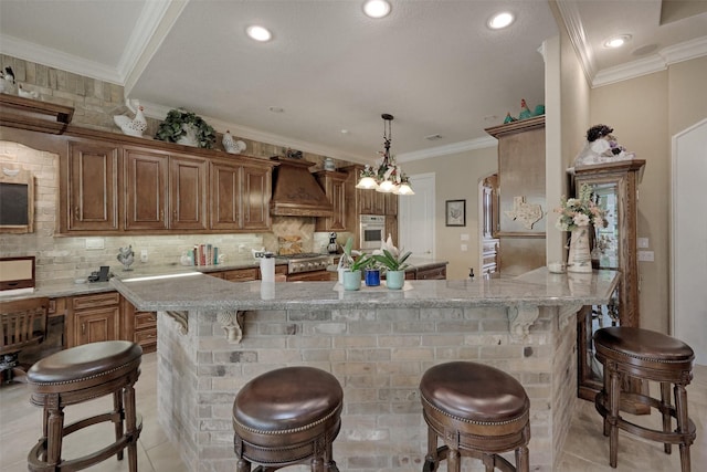69 W Shore Ln, Montgomery, TX 77356 - kitchen with custom exhaust hood, oven, light stone countertops, decorative backsplash, and crown molding