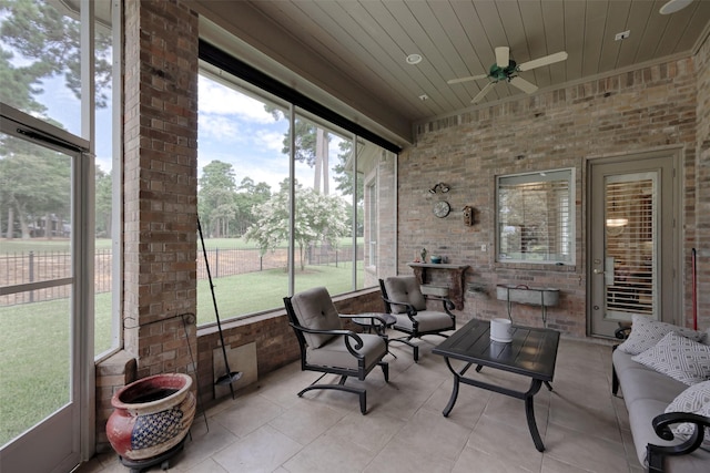 69 W Shore Ln, Montgomery, TX 77356 - sunroom featuring a ceiling fan and an outdoor hangout area
