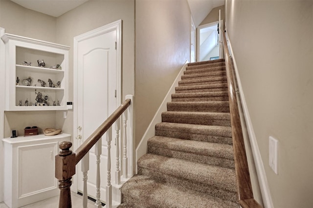 69 W Shore Ln, Montgomery, TX 77356 - staircase featuring built in shelves