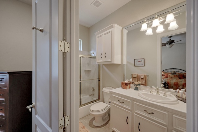 69 W Shore Ln, Montgomery, TX 77356 - ensuite bathroom with vanity, bath / shower combo with glass door, ceiling fan, and tile patterned floors