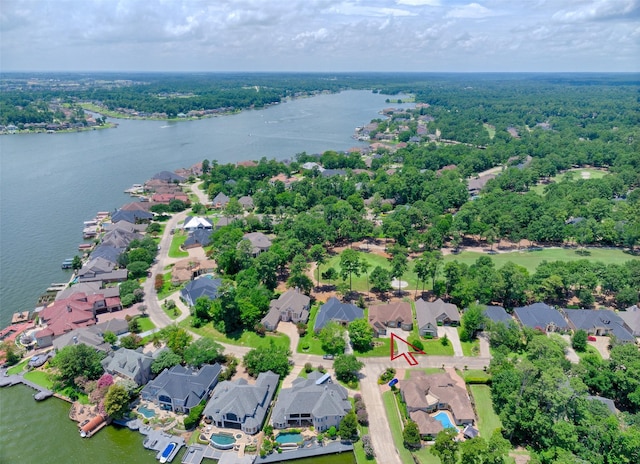 69 W Shore Ln, Montgomery, TX 77356 - aerial perspective of suburban area with a nearby body of water