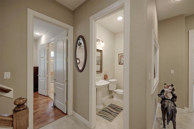69 W Shore Ln, Montgomery, TX 77356 - hall with light tile patterned floors and baseboards