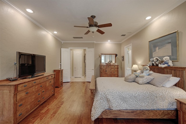 69 W Shore Ln, Montgomery, TX 77356 - bedroom with light wood-type flooring, ornamental molding, recessed lighting, and a ceiling fan