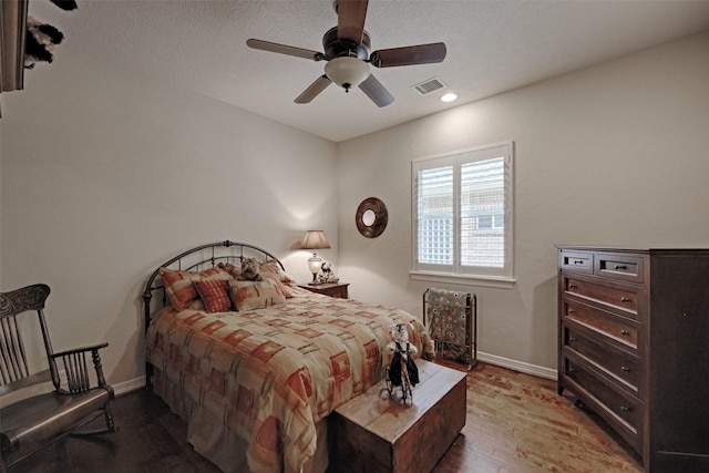 69 W Shore Ln, Montgomery, TX 77356 - bedroom featuring wood finished floors, a ceiling fan, and recessed lighting