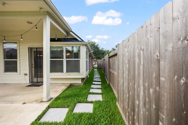 13315 Lake Passage Ln, Houston, TX 77044 - fenced backyard featuring a patio