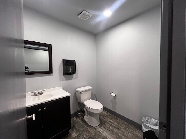 10195 Doolittle, Mckinney, TX 75071 - bathroom featuring vanity and wood finished floors