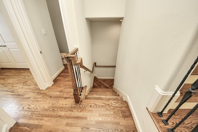5617 Kiam St Unit A, Houston, TX 77007 - stairway featuring wood finished floors