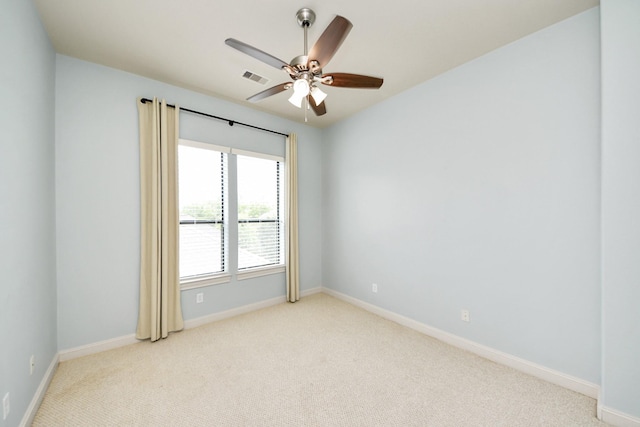 5617 Kiam St Unit A, Houston, TX 77007 - carpeted spare room featuring baseboards and ceiling fan