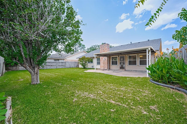 5615 Briarwood Forest Dr, Houston, TX 77088 - rear view of house featuring a patio, a chimney, and a fenced backyard