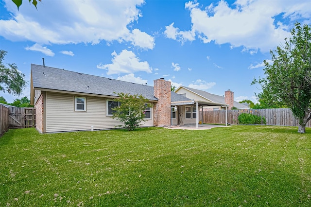 5615 Briarwood Forest Dr, Houston, TX 77088 - rear view of house featuring a patio area, a fenced backyard, a shingled roof, and a chimney