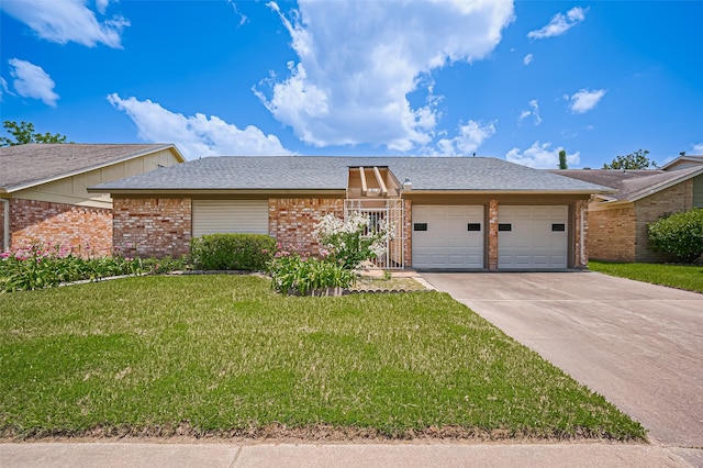 5615 Briarwood Forest Dr, Houston, TX 77088 - view of front of property featuring brick siding, a garage, concrete driveway, and a front lawn