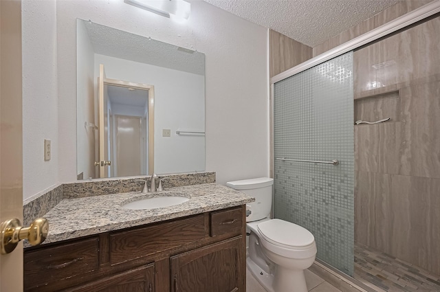 5615 Briarwood Forest Dr, Houston, TX 77088 - full bath featuring vanity, a stall shower, a textured ceiling, and tile patterned floors
