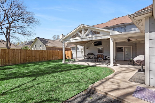 5411 Holly View Dr, Houston, TX 77091 - view of yard with a ceiling fan and a patio