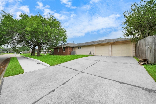 3111 Tanglebriar Dr, Pasadena, TX 77503 - ranch-style house featuring concrete driveway, a garage, and brick siding