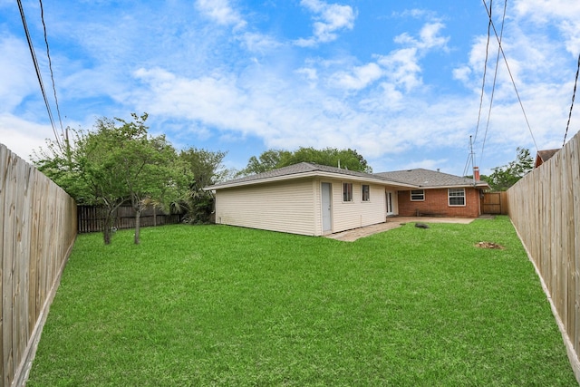 3111 Tanglebriar Dr, Pasadena, TX 77503 - fenced backyard with a patio