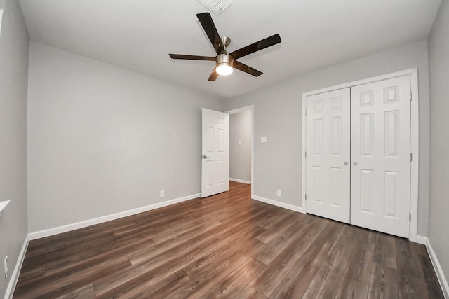 3111 Tanglebriar Dr, Pasadena, TX 77503 - unfurnished bedroom featuring dark wood-style flooring, a closet, and a ceiling fan
