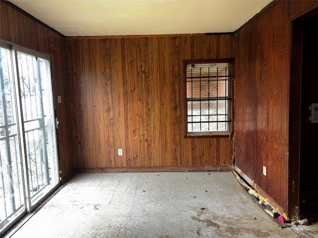5326 Wenda St, Houston, TX 77033 - unfurnished room with wood walls and baseboards