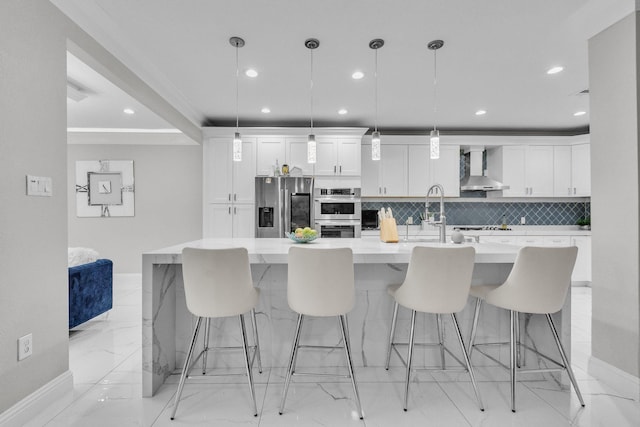 9910 Tulip, Conroe, TX 77385 - kitchen featuring stainless steel appliances, wall chimney exhaust hood, backsplash, white cabinetry, and recessed lighting
