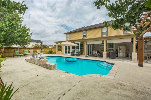 9910 Tulip, Conroe, TX 77385 - view of pool with a patio