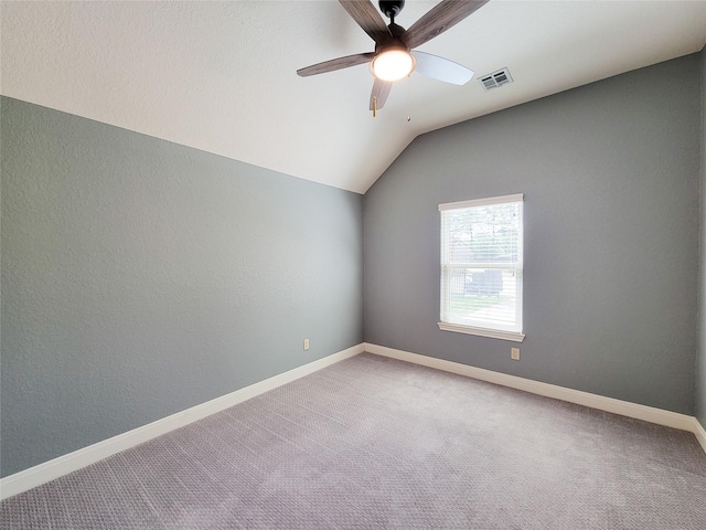 4021 Fatta Dr, Dickinson, TX 77539 - spare room featuring lofted ceiling, ceiling fan, and carpet floors