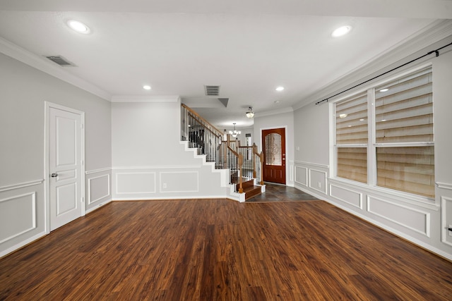 1517 Asbury St, Houston, TX 77007 - foyer entrance with a decorative wall, crown molding, stairs, recessed lighting, and dark wood finished floors
