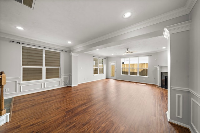 1517 Asbury St, Houston, TX 77007 - unfurnished living room featuring a fireplace with flush hearth, crown molding, wood finished floors, ceiling fan, and recessed lighting
