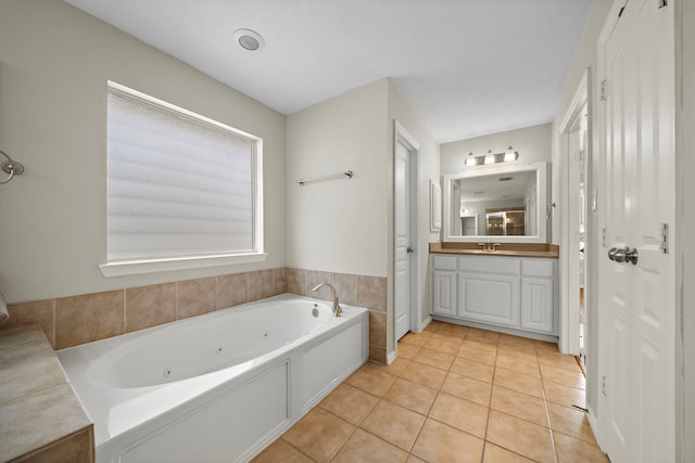 1517 Asbury St, Houston, TX 77007 - full bath featuring a jetted tub, vanity, and tile patterned floors