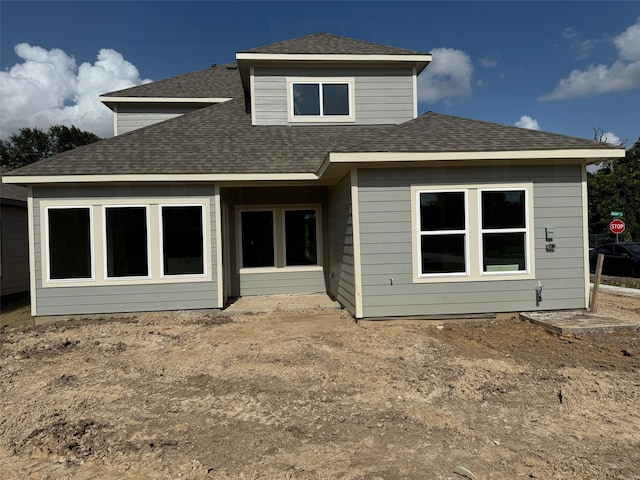 5503 Bacher St, Houston, TX 77028 - rear view of house with a shingled roof