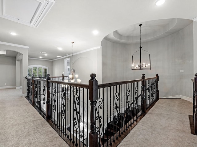 11913 Barryknoll Ln, Houston, TX 77024 - corridor with carpet floors, a chandelier, crown molding, recessed lighting, and an upstairs landing