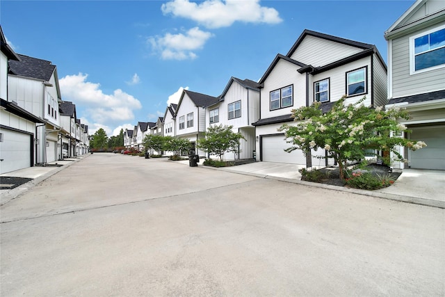 6727 Parker Oaks Ln, Houston, TX 77076 - view of concrete street featuring a residential view