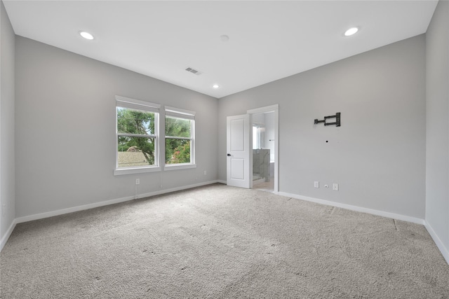 6727 Parker Oaks Ln, Houston, TX 77076 - unfurnished bedroom featuring carpet floors, recessed lighting, and ensuite bath