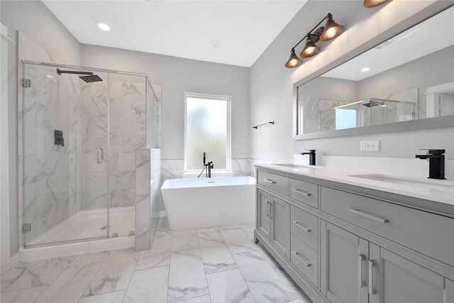 6727 Parker Oaks Ln, Houston, TX 77076 - full bath with a freestanding tub, double vanity, a marble finish shower, and marble finish floors