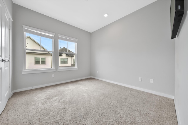 6727 Parker Oaks Ln, Houston, TX 77076 - carpeted empty room with baseboards and recessed lighting