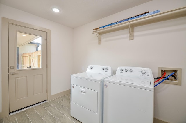 14835 Charlmont Dr, Houston, TX 77083 - laundry area with independent washer and dryer and baseboards