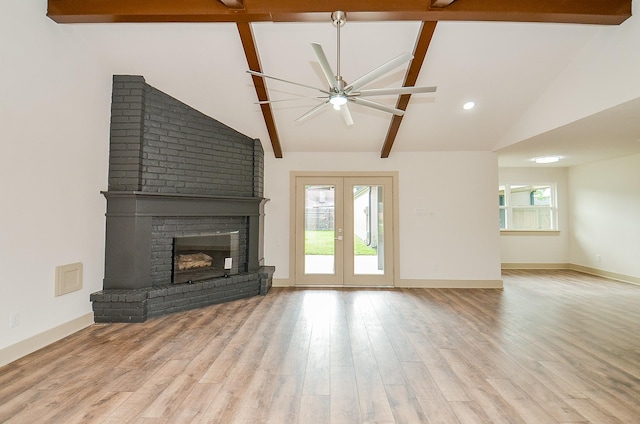 14835 Charlmont Dr, Houston, TX 77083 - unfurnished living room with ceiling fan, wood finished floors, a brick fireplace, and recessed lighting