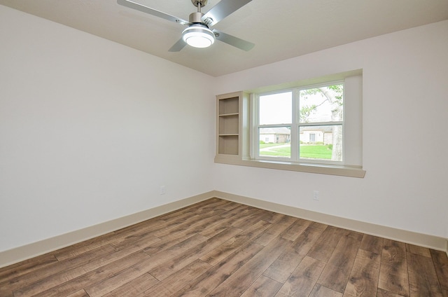 14835 Charlmont Dr, Houston, TX 77083 - empty room featuring wood finished floors and a ceiling fan