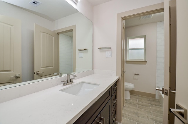 14835 Charlmont Dr, Houston, TX 77083 - full bath featuring vanity, wood finished floors, and shower / bathtub combination