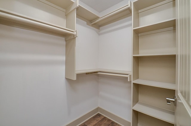 14835 Charlmont Dr, Houston, TX 77083 - spacious closet featuring wood finished floors