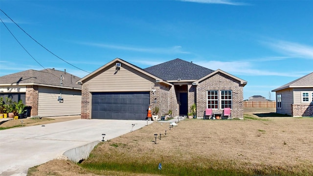 406 Rd 5102 Unit L, Cleveland, TX 77327 - view of front of property featuring brick siding, a garage, and driveway