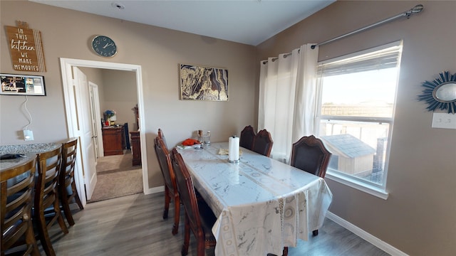 406 Rd 5102 Unit L, Cleveland, TX 77327 - dining area with light wood-style flooring