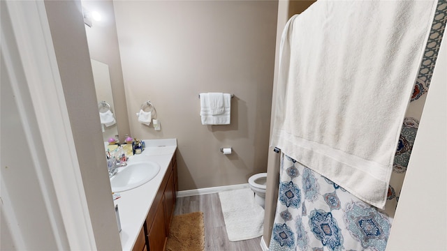 406 Rd 5102 Unit L, Cleveland, TX 77327 - bathroom featuring vanity and wood finished floors