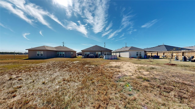 406 Rd 5102 Unit L, Cleveland, TX 77327 - rear view of house