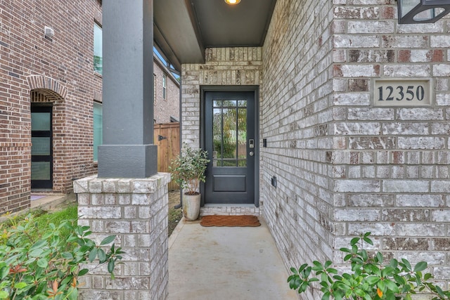 12350 Castano Creek Dr, Humble, TX 77346 - doorway to property featuring brick siding