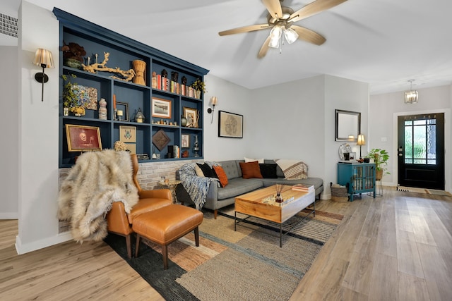 12350 Castano Creek Dr, Humble, TX 77346 - living room featuring wood finished floors and ceiling fan