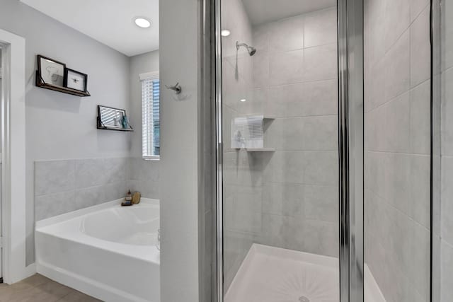 12350 Castano Creek Dr, Humble, TX 77346 - bathroom featuring a stall shower and a garden tub