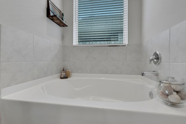 12350 Castano Creek Dr, Humble, TX 77346 - full bath with a bath and tile walls
