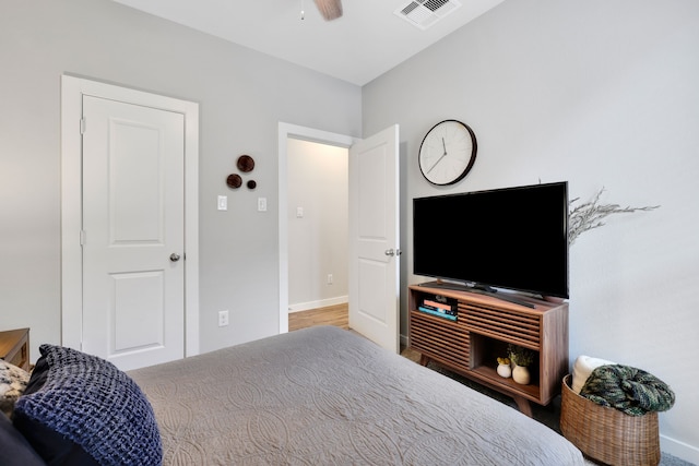12350 Castano Creek Dr, Humble, TX 77346 - bedroom with baseboards and a ceiling fan