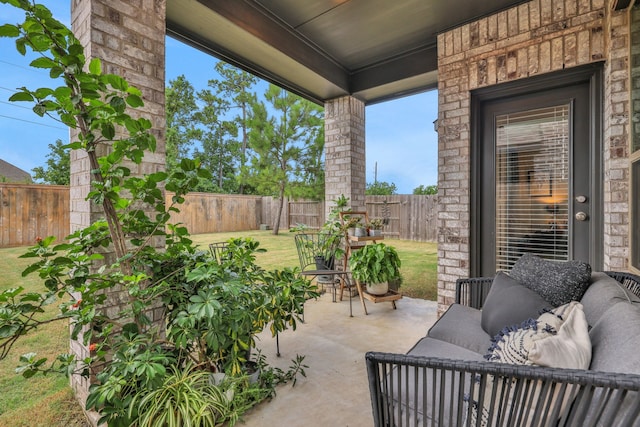 12350 Castano Creek Dr, Humble, TX 77346 - fenced backyard with a patio and outdoor lounge area