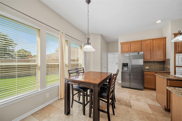 3106 Rainbow Ct, Pearland, TX 77584 - dining space featuring baseboards and recessed lighting