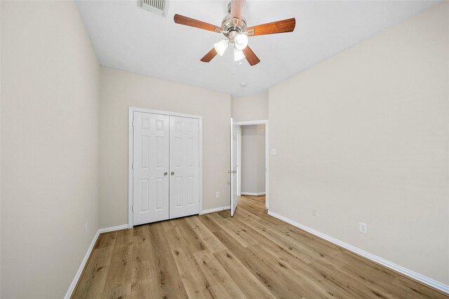 3106 Rainbow Ct, Pearland, TX 77584 - unfurnished bedroom featuring light wood-type flooring, a closet, and ceiling fan
